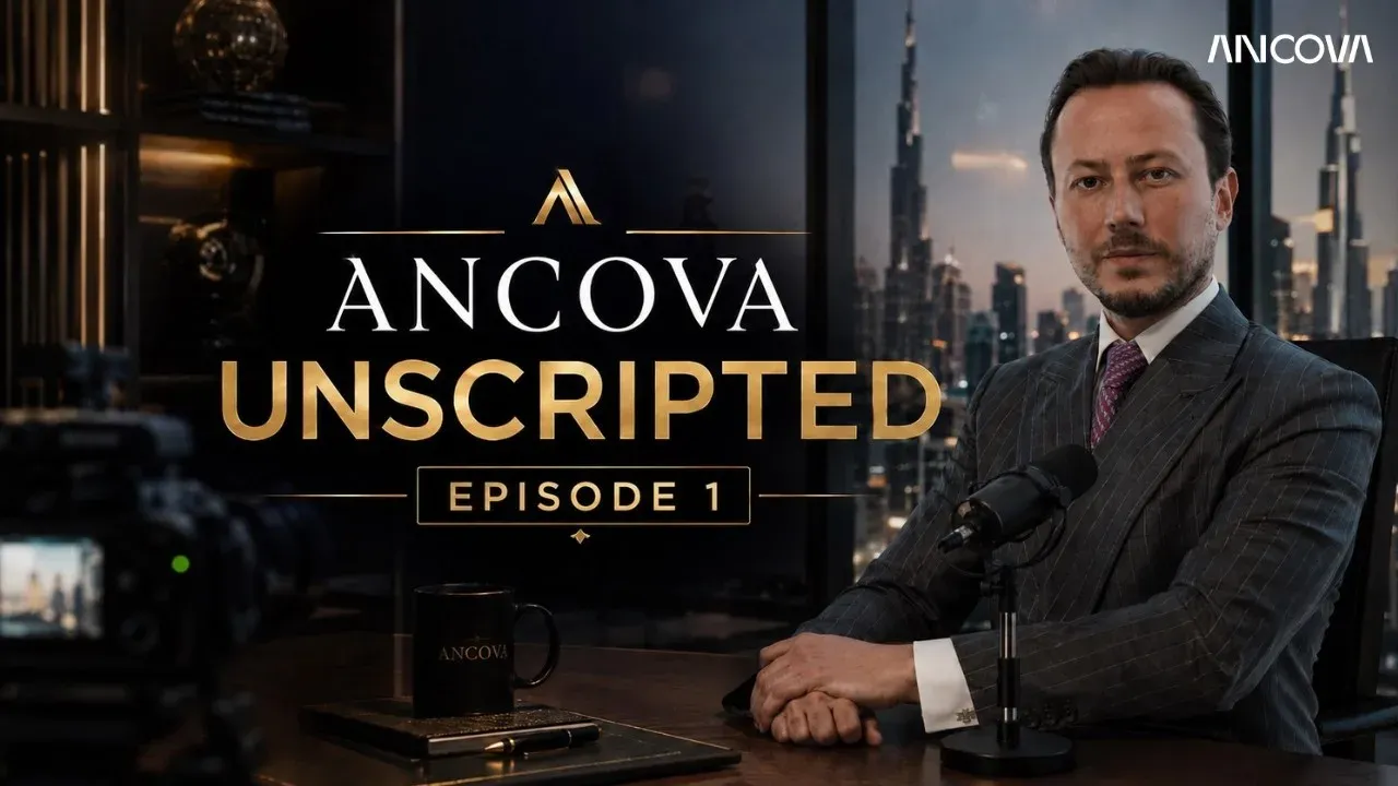 Enis, co-founder and managing partner of Ancova Associates, on camera in Ancova Unscripted, Episode 1